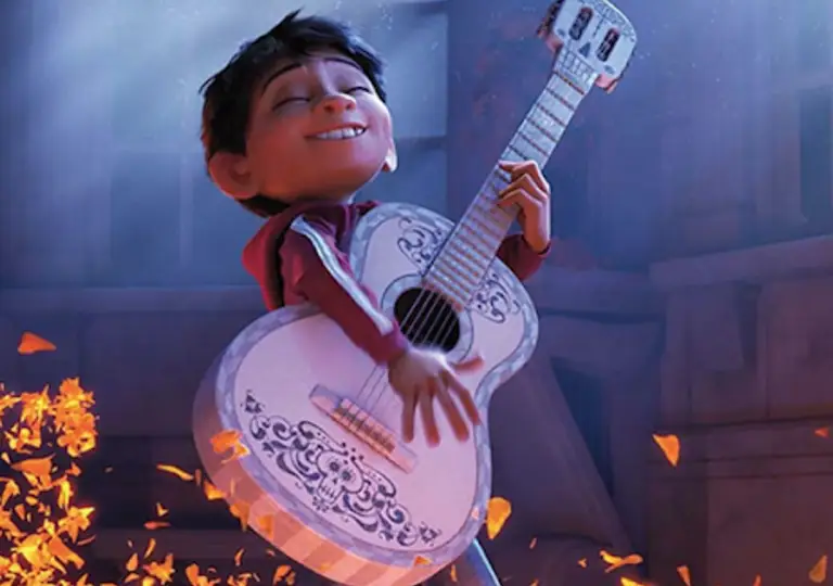Miguel from Coco strumming guitar