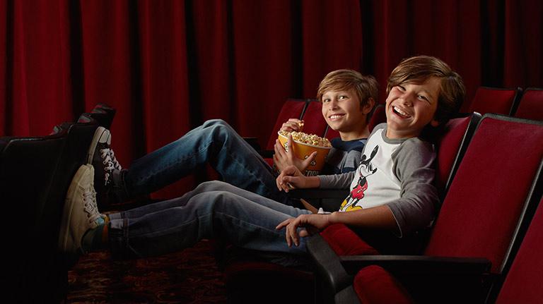 Two Boys Watching Disney Entertainment 