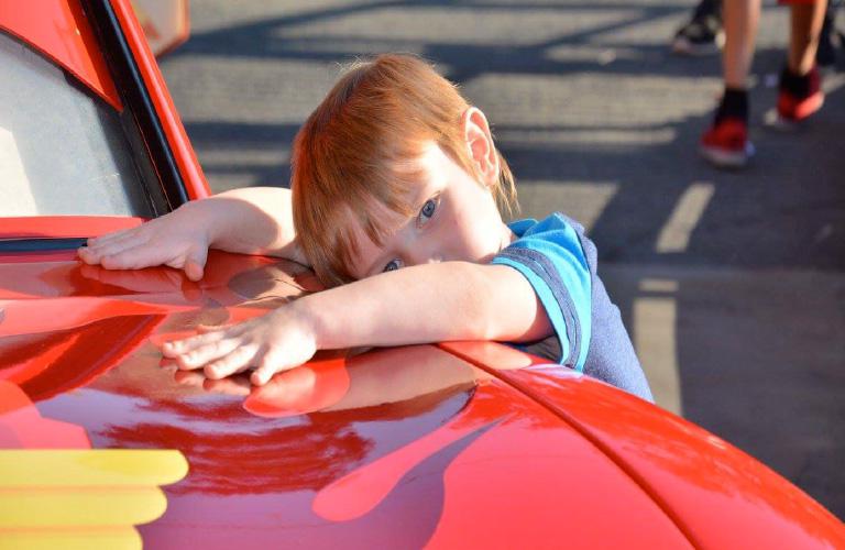 Boy with Real life Lightning McQueen