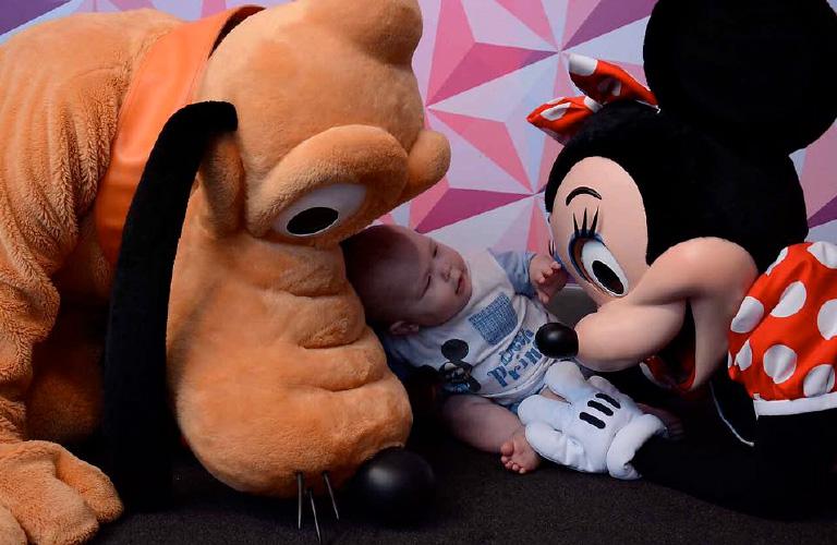 Disney Minnie and Pluto with a baby