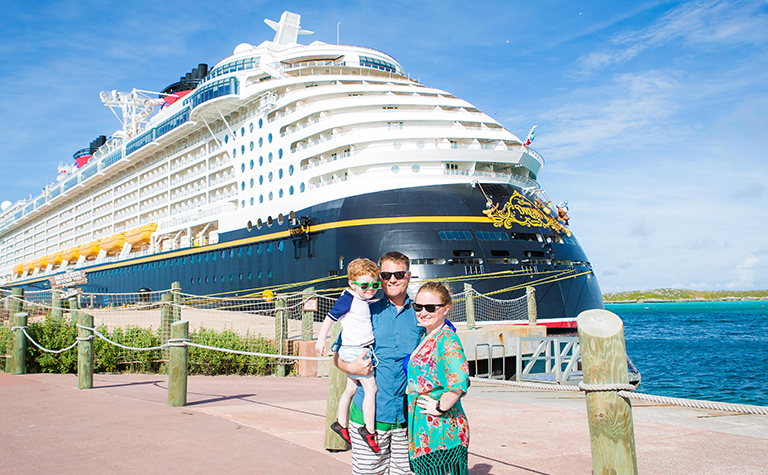 Couple in front of Disney cruise ship