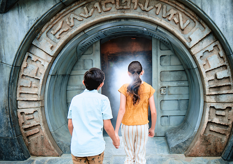 Kids in front of Dok-Ondar’s Den of Antiquities