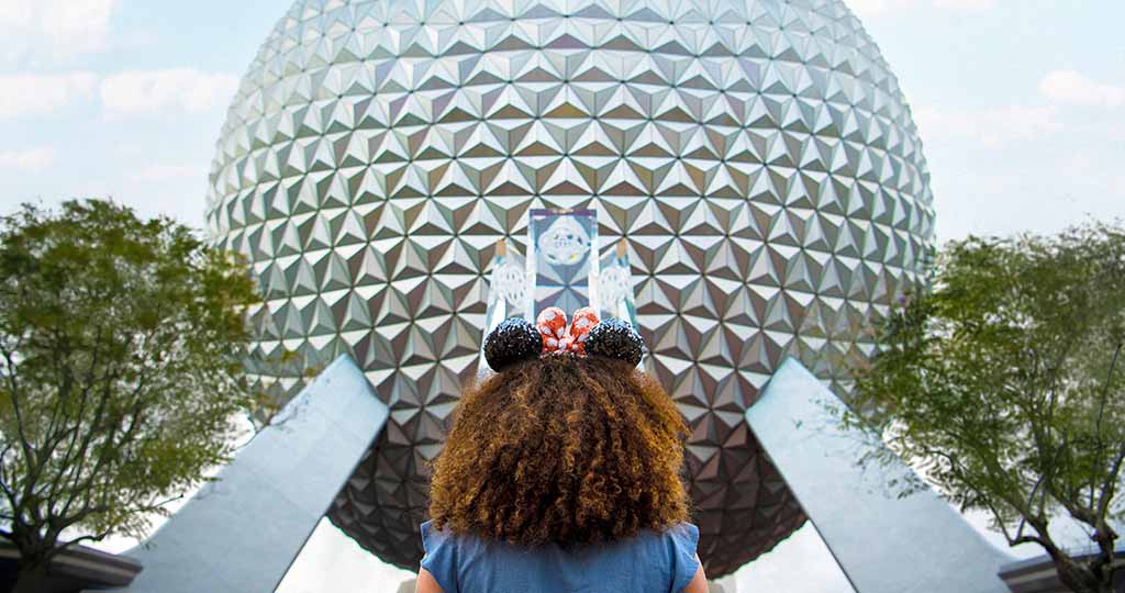 Girl looking at Spaceship Earth