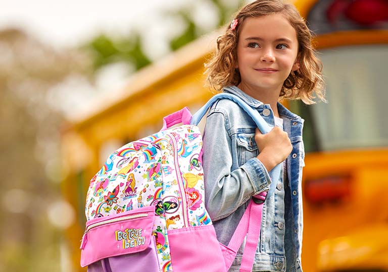 Girl with princess backpack