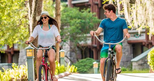 Couple riding bikes