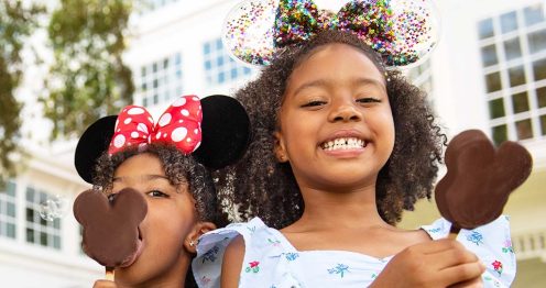 Girls smiling with Mickey ice-cream