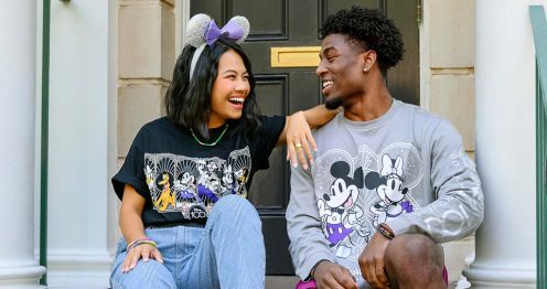Girl and guy in Disney merchandise