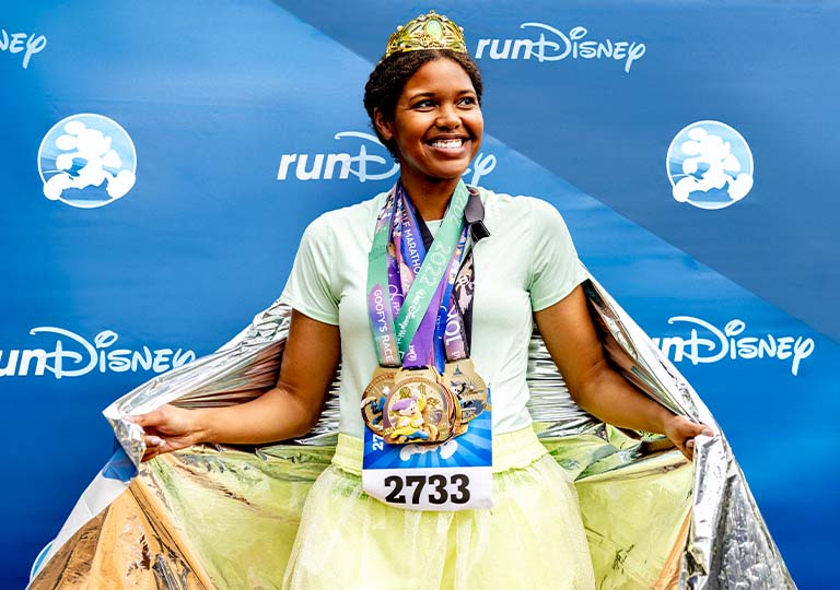 Runner with medals