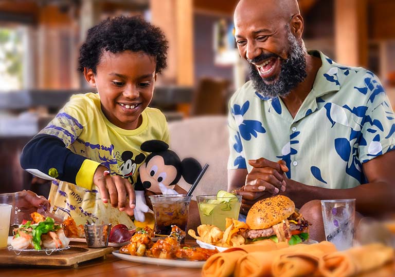 Dad and son eating at Geyser Point