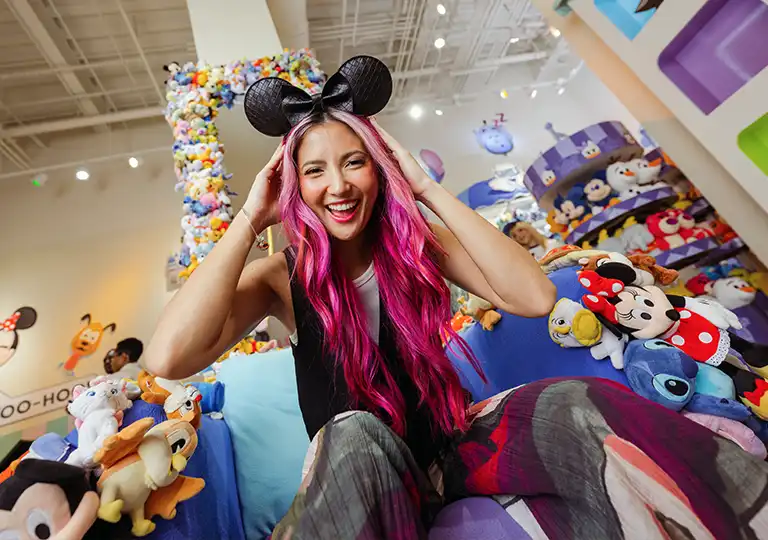 Woman with Mickey Ears at a store