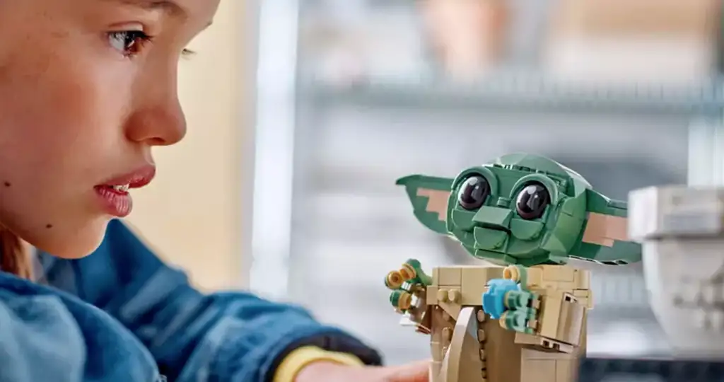 Child playing with LEGO