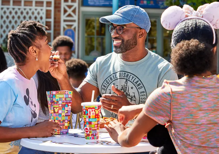 Family enjoying a meal at Disneyland