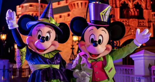 Minnie Mouse and Mickey Mouse in Halloween outfit