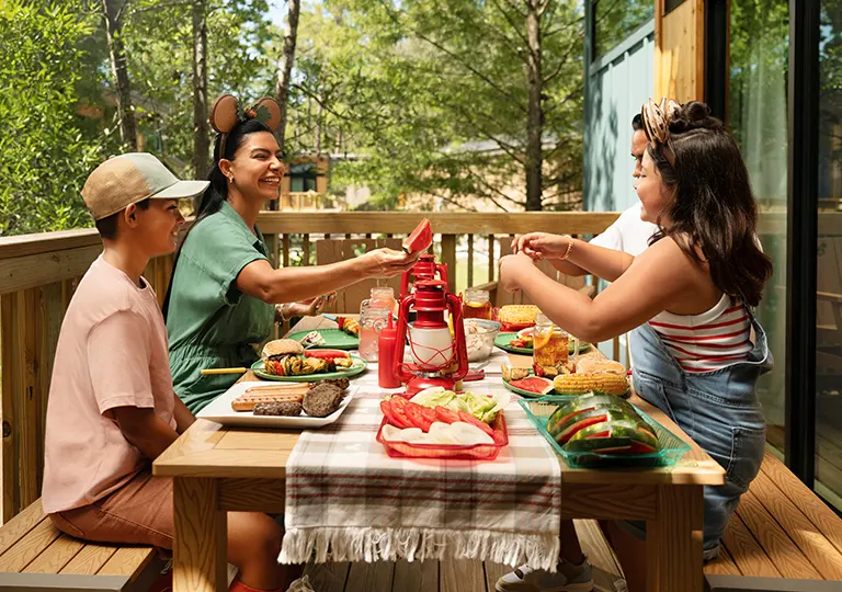 Family enjoying dinner at campgrounds 