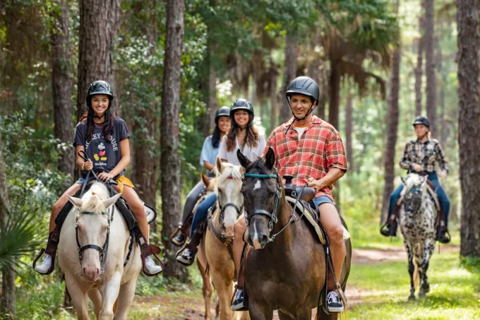 Family horseback trail riding at Disney's Fort Wilderness Resort & Campground