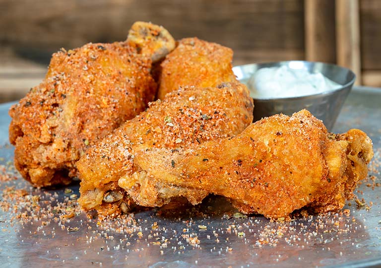 Cheese Pizza-flavored Wings at Cluck-A-Doodle-Moo Marketplace