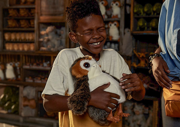 Boy with intergalactic pet at Creature Stall