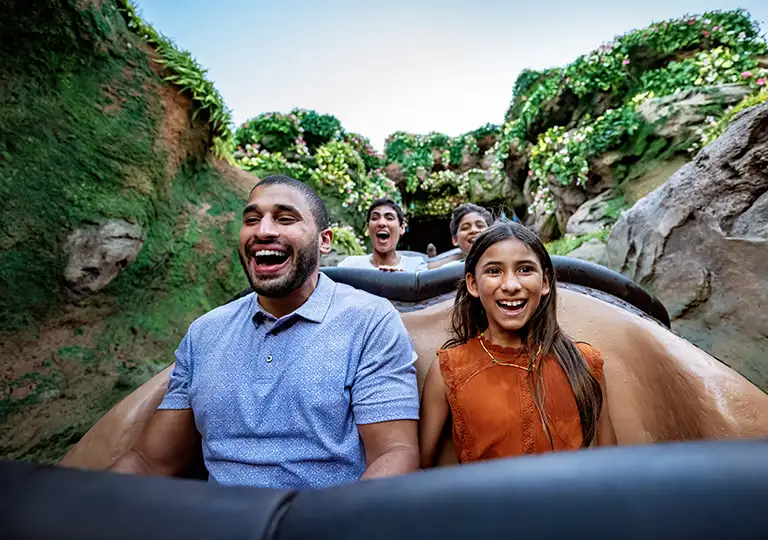 Man and woman riding attraction