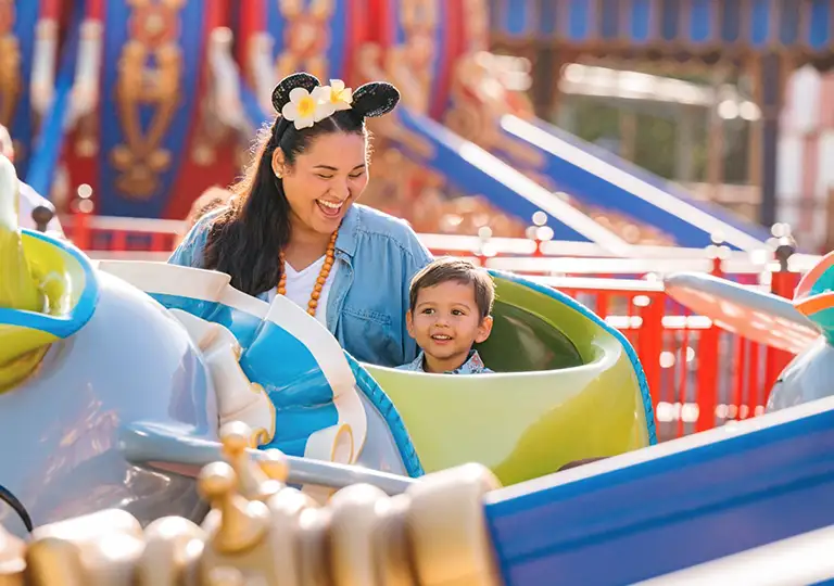 Mom and son riding attraction