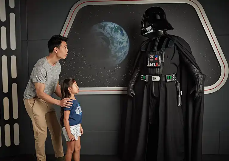 Father and daughter with Darth Vader