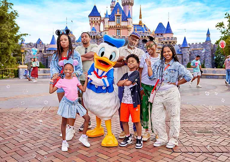 Donald Duck and family in front of castle