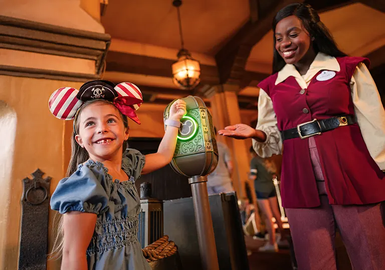 Girl scanning Magic Band
