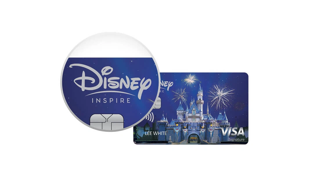 Disney Inspire Visa Signature card design with Sleeping Beauty Castle at night and fireworks.