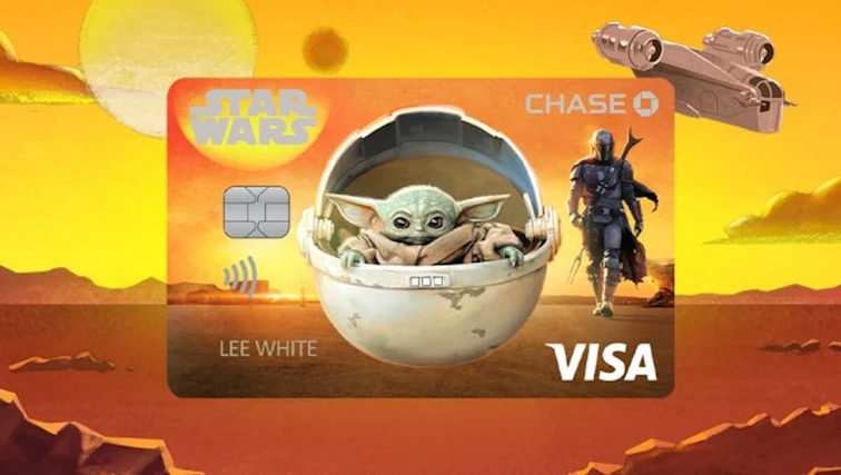 Star Wars Visa credit card design featuring Grogu in his floating pram with the Mandalorian and starship on an orange desert planet background.