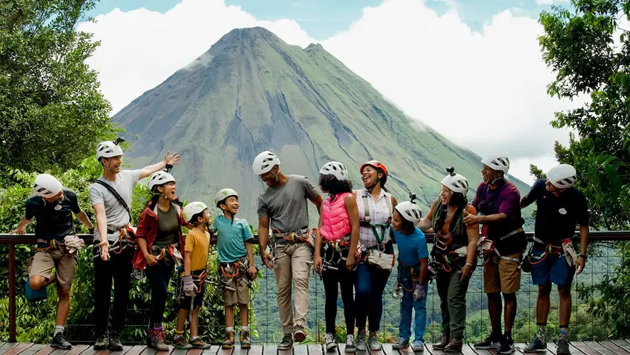 Family ready to zipline at Arenal Volcano National Park in Costa Rica.