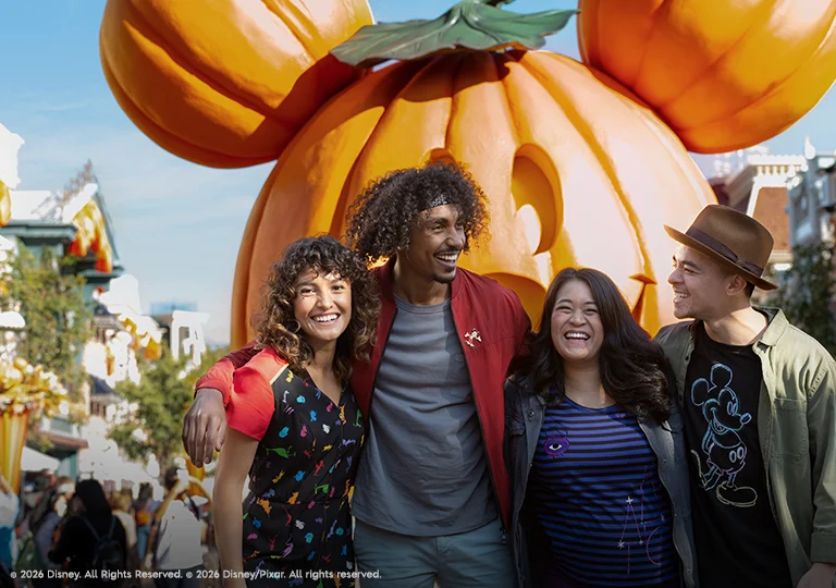 Guests in front of Mickey Mouse Pumpkin