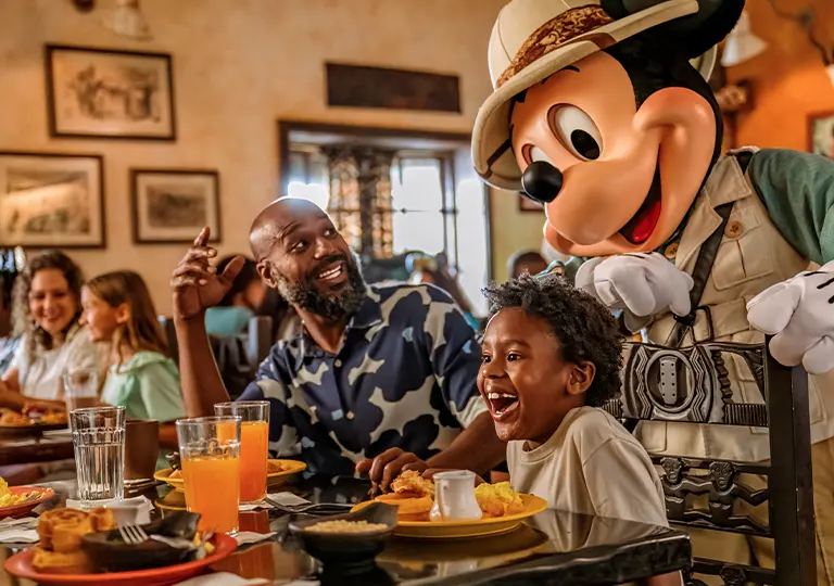 Mickey with guests at Tusker House Restaurant
